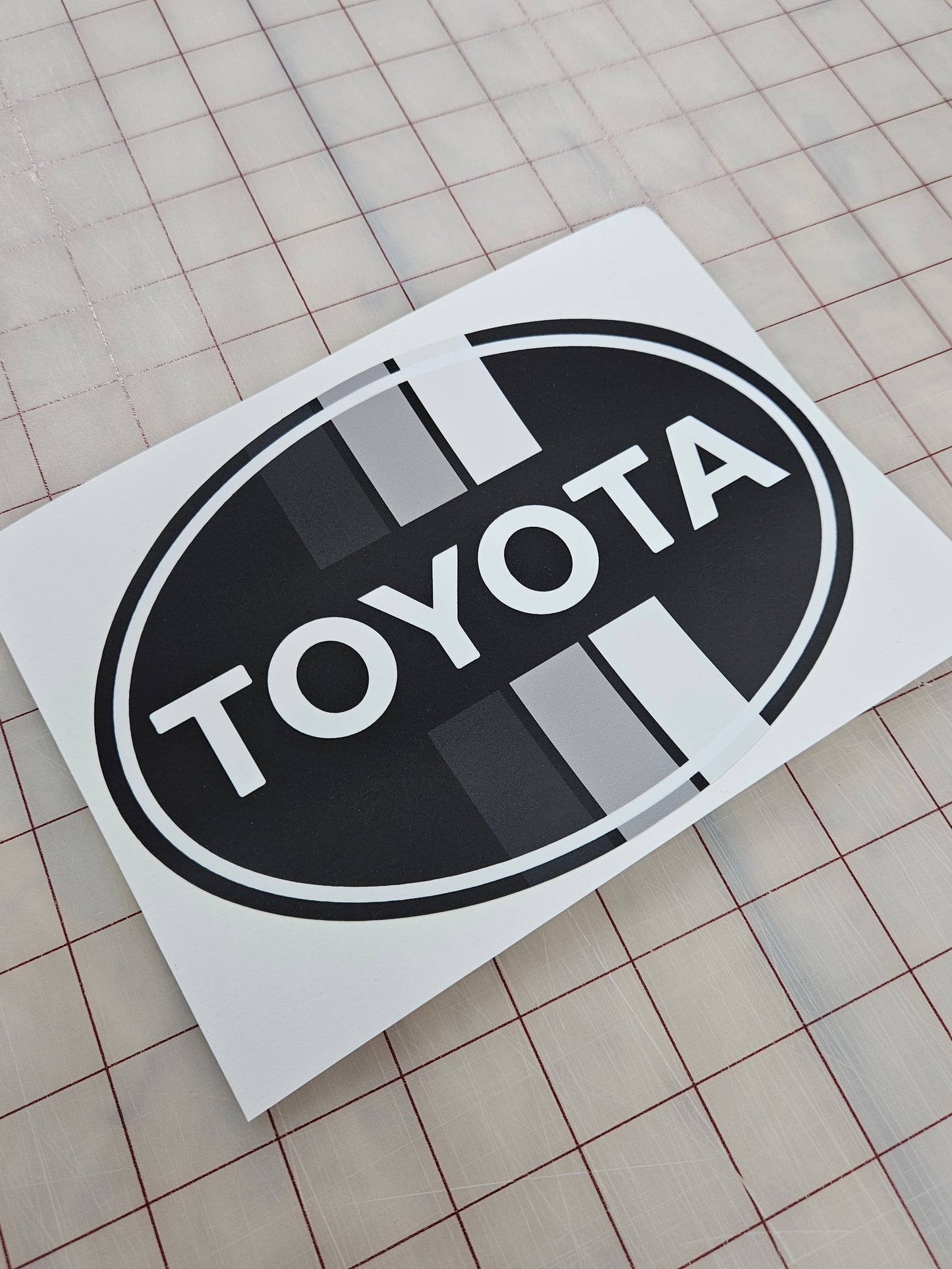 2018-2023 Vintage Toyota Tacoma Grey-Striped Front Emblem Vinyl Overlay