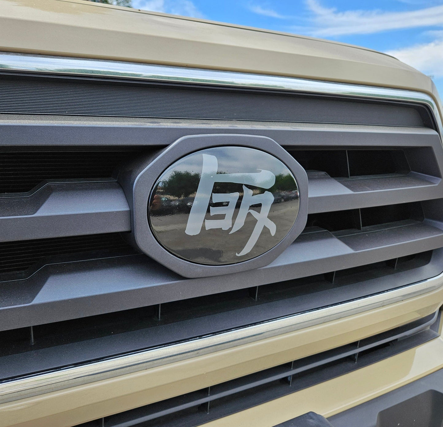 2018-2023 Toyota Tacoma Front Emblem Vinyl Overlay - "TEQ" Logo