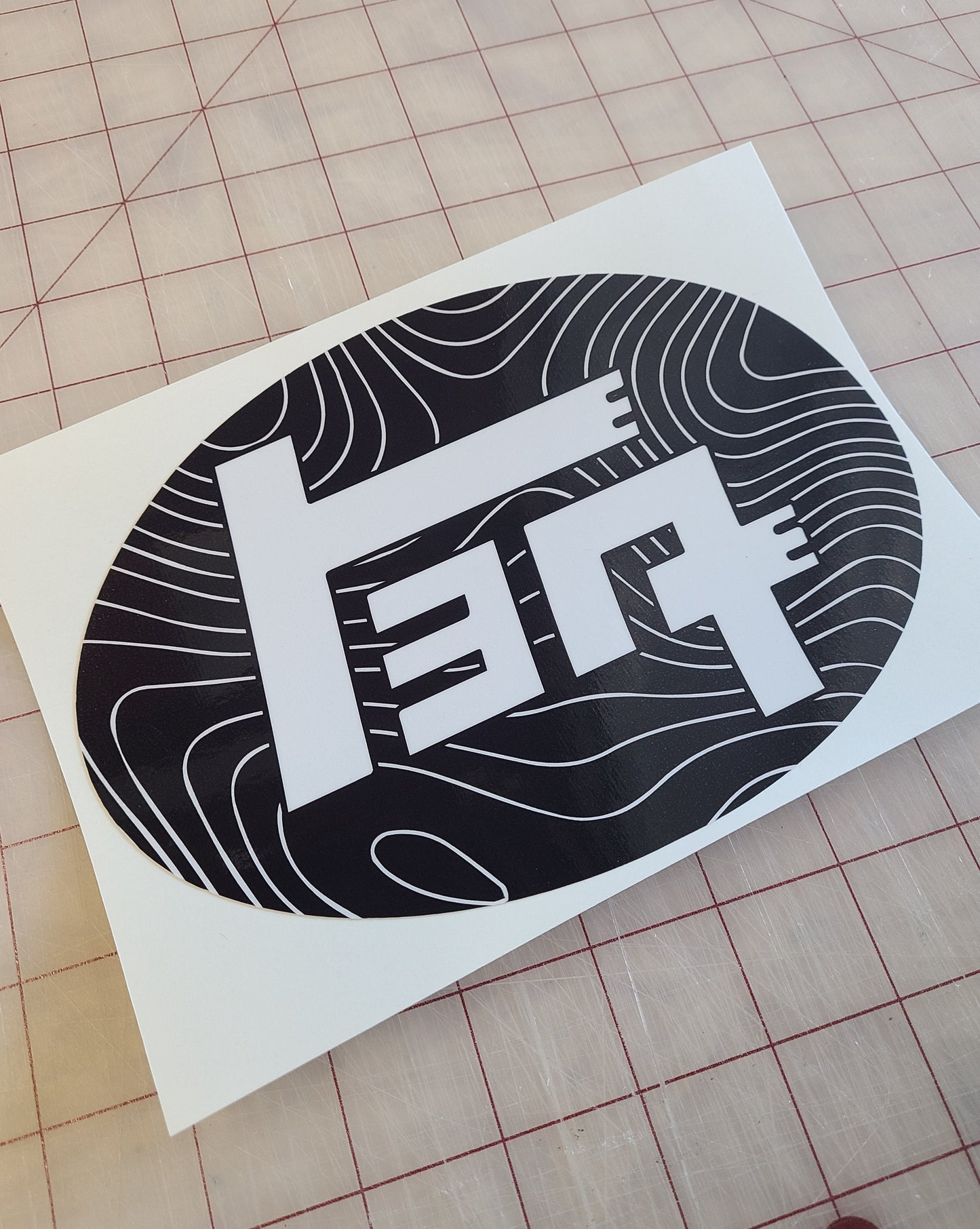 2018-2023 Toyota Tacoma Topographic Front Emblem Vinyl Overlay - "TEQ" Logo