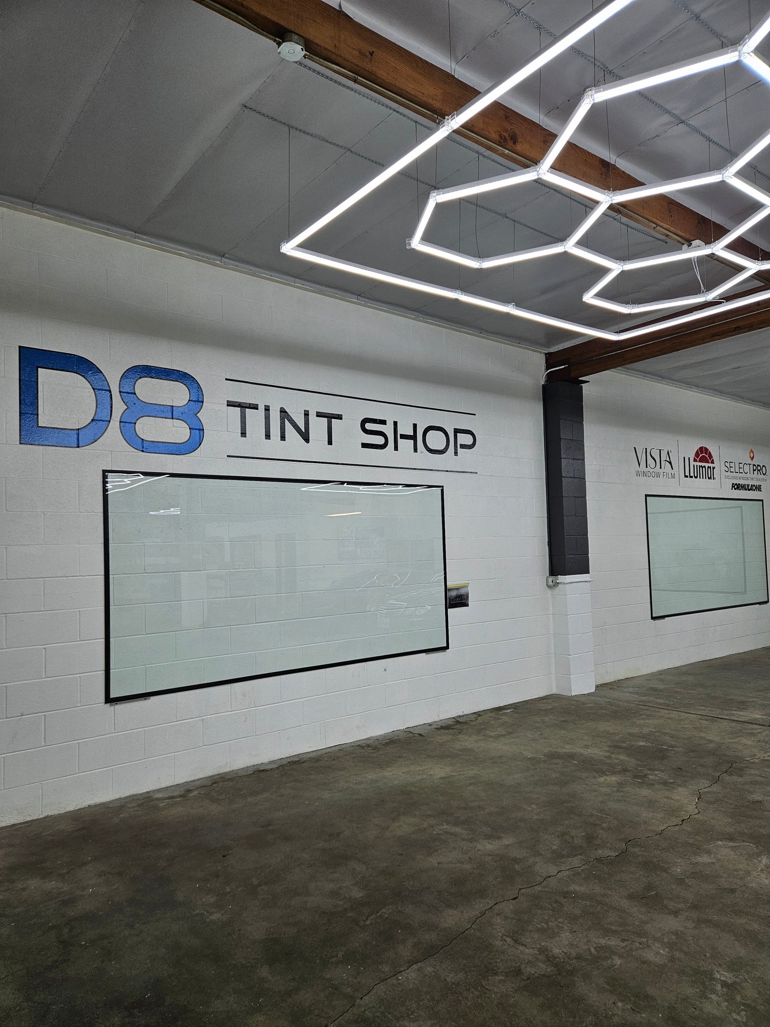 graphics print and installed for a local tint ship. graphics include company logo and brands